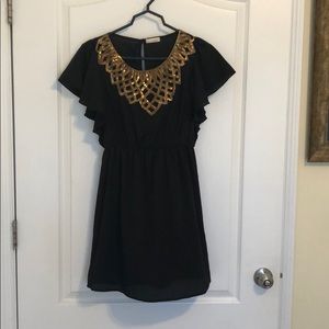 Black and gold mini party dress